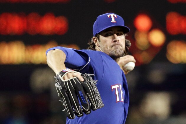 Texas Rangers starting pitcher Cole Hamels throws against the Seattle Mariners in a baseball game Thursday, Sept. 21, 2017, in Seattle. (AP Photo/Elaine Thompson)