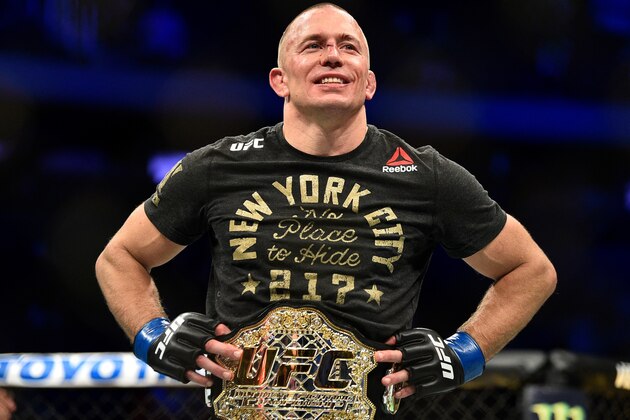 NEW YORK, NY - NOVEMBER 04:  Georges St-Pierre of Canada celebrates after defeating Michael Bisping of England in their UFC middleweight championship bout during the UFC 217 event inside Madison Square Garden on November 4, 2017 in New York City. (Photo by Jeff Bottari/Zuffa LLC/Zuffa LLC via Getty Images)