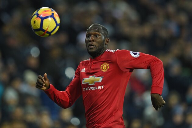 Manchester United's Belgian striker Romelu Lukaku chases the ball during the English Premier League football match between West Bromwich Albion and Manchester United at The Hawthorns stadium in West Bromwich, central England, on December 17, 2017.
 / AFP PHOTO / Oli SCARFF / RESTRICTED TO EDITORIAL USE. No use with unauthorized audio, video, data, fixture lists, club/league logos or 'live' services. Online in-match use limited to 75 images, no video emulation. No use in betting, games or single club/league/player publications.  /         (Photo credit should read OLI SCARFF/AFP/Getty Images)