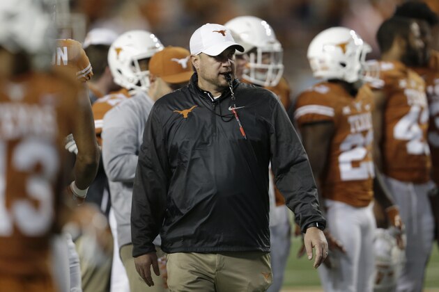 AUSTIN, TX - NOVEMBER 24:  Head coach Tom Herman of the Texas Longhorns  watches players warm up before the game against the Texas Tech Red Raiders at Darrell K Royal-Texas Memorial Stadium on November 24, 2017 in Austin, Texas.  (Photo by Tim Warner/Getty Images)
