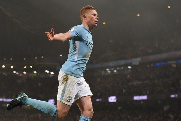 Manchester City's Belgian midfielder Kevin De Bruyne celebrates after scoring during the English Premier League football match between Manchester City and Tottenham Hotspur at the Etihad Stadium in Manchester, north west England, on December 16, 2017. / AFP PHOTO / PAUL ELLIS / RESTRICTED TO EDITORIAL USE. No use with unauthorized audio, video, data, fixture lists, club/league logos or 'live' services. Online in-match use limited to 75 images, no video emulation. No use in betting, games or single club/league/player publications.  /         (Photo credit should read PAUL ELLIS/AFP/Getty Images)