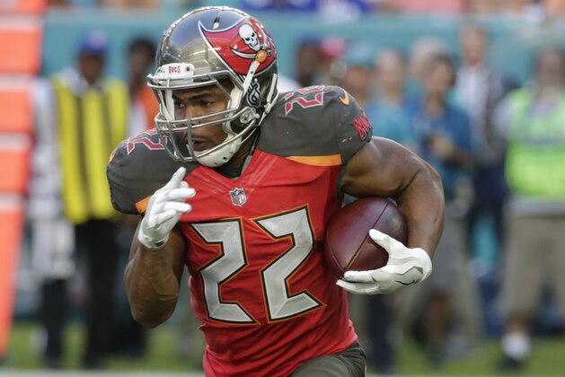 Tampa Bay Buccaneers running back Doug Martin (22) runs the ball, during the second half of an NFL football game against the Miami Dolphins, Sunday, Nov. 19, 2017, in Miami Gardens, Fla. (AP Photo/Lynne Sladky)