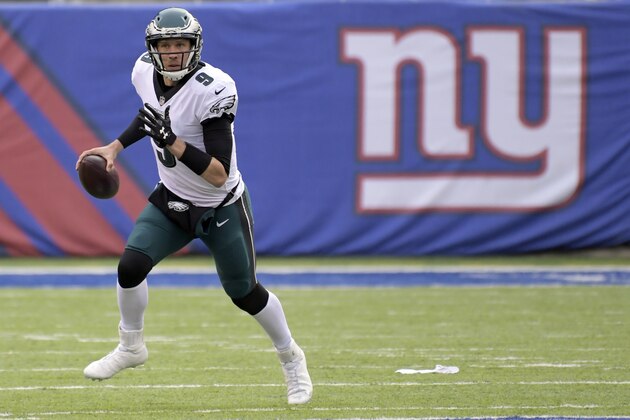Philadelphia Eagles quarterback Nick Foles looks to pass against the New York Giants during the second half of an NFL football game, Sunday, Dec. 17, 2017, in East Rutherford, N.J. (AP Photo/Bill Kostroun)