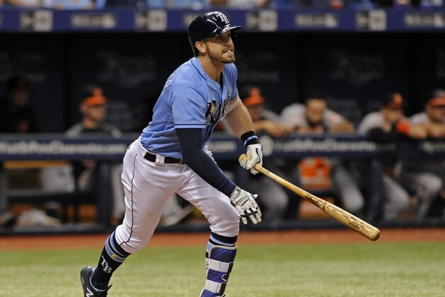 Tampa Bay Rays' Evan Longoria hits a RBI-double off Baltimore Orioles reliever Brad Brach during the eighth inning of a baseball game Sunday, Oct. 1, 2017, in St. Petersburg, Fla. (AP Photo/Steve Nesius)