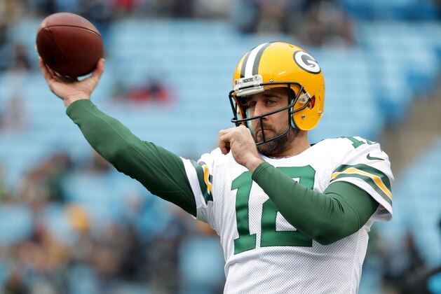 CHARLOTTE, NC - DECEMBER 17:  Aaron Rodgers #12 of the Green Bay Packers warms up before their game against the Carolina Panthers at Bank of America Stadium on December 17, 2017 in Charlotte, North Carolina.  (Photo by Streeter Lecka/Getty Images)
