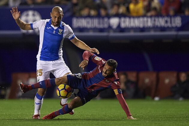 VALENCIA, SPAIN - DECEMBER 19:  Pedro Lopez (R) of Levante competes for the ball with Nordin Amrabat of Leganes during the La Liga match between Levante and Leganes at Ciutat de Valencia stadium on December 19, 2017 in Valencia, Spain.  (Photo by fotopress/Getty Images)