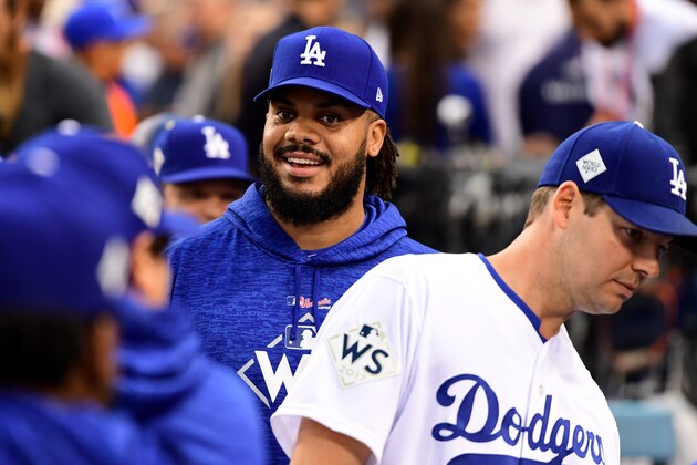 LOS ANGELES, CA - NOVEMBER 01:  Kenley Jansen #74 and Rich Hill #44 of the Los Angeles Dodgers look on before game seven of the 2017 World Series against the Houston Astros at Dodger Stadium on November 1, 2017 in Los Angeles, California.  (Photo by Harry How/Getty Images)