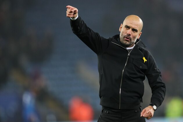 LEICESTER, ENGLAND - DECEMBER 19: Pep Guardiola the head coach / manager of Manchester City celebrates during the Carabao Cup Quarter-Final match between here Leicester City v Manchester City at The King Power Stadium on December 19, 2017 in Leicester, England. (Photo by Robbie Jay Barratt - AMA/Getty Images)