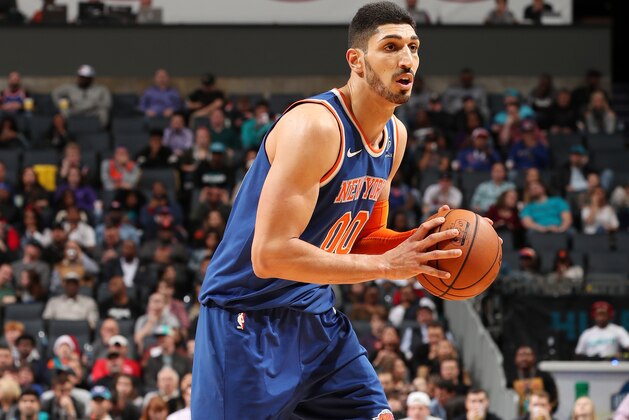 CHARLOTTE, NC - DECEMBER 18: Enes Kanter #00 of the New York Knicks handles the ball against the Charlotte Hornets on December 18, 2017 at Spectrum Center in Charlotte, North Carolina. NOTE TO USER: User expressly acknowledges and agrees that, by downloading and or using this photograph, User is consenting to the terms and conditions of the Getty Images License Agreement.  Mandatory Copyright Notice:  Copyright 2017 NBAE (Photo by Kent Smith/NBAE via Getty Images)