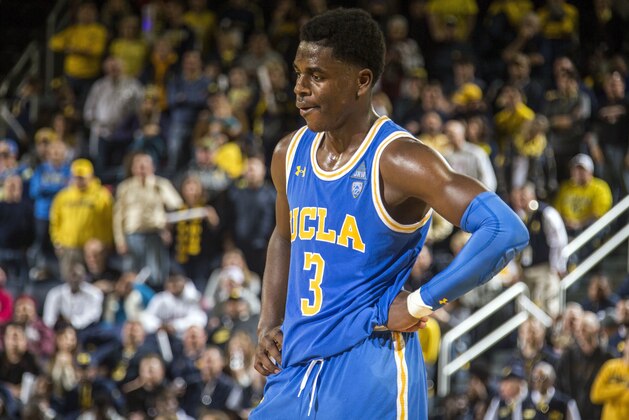 UCLA guard Aaron Holiday (3) catches his breath during a Michigan free throw in the final seconds of overtime of an NCAA college basketball game at Crisler Center in Ann Arbor, Mich., Saturday, Dec. 9, 2017. Michigan won 78-69 in overtime. (AP Photo/Tony Ding)