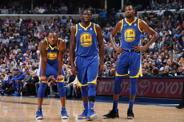 MEMPHIS, TN - OCTOBER 21:  Andre Iguodala #9, Draymond Green #23, and Kevin Durant #35 of the Golden State Warriors looks on during the game against the Memphis Grizzlies on October 21, 2017 at FedExForum in Memphis, Tennessee. NOTE TO USER: User expressly acknowledges and agrees that, by downloading and or using this photograph, User is consenting to the terms and conditions of the Getty Images License Agreement. Mandatory Copyright Notice: Copyright 2017 NBAE (Photo by Joe Murphy/NBAE via Getty Images)