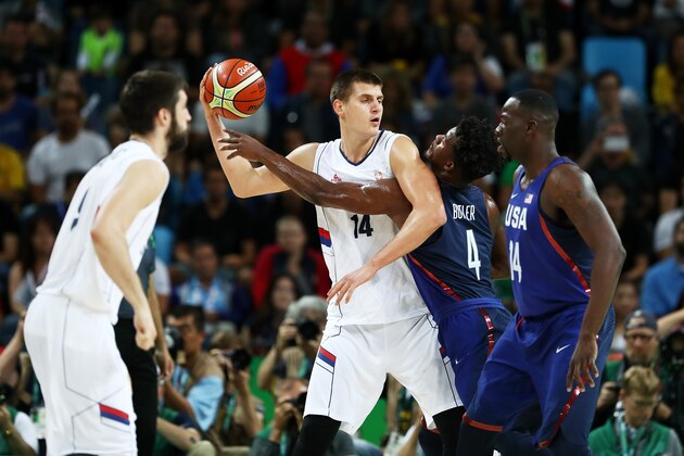 RIO DE JANEIRO, BRAZIL - AUGUST 21:  Nikola Jokic #14 of Serbia looks to pass the ball over Jimmy Butler #4 of United States during the Men's Gold medal game on Day 16 of the Rio 2016 Olympic Games at Carioca Arena 1 on August 21, 2016 in Rio de Janeiro, Brazil.  (Photo by Elsa/Getty Images)
