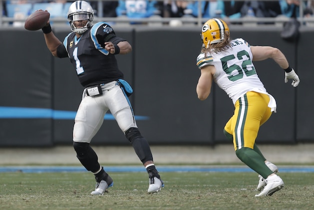 Carolina Panthers' Cam Newton (1) throws a pass under pressure from Green Bay Packers' Clay Matthews (52) during the first half of an NFL football game in Charlotte, N.C., Sunday, Dec. 17, 2017. (AP Photo/Bob Leverone)