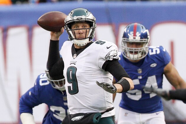 EAST RUTHERFORD, NJ - DECEMBER 17:  Quarterback Nick Foles #9 of the Philadelphia Eagles passes on the run in an NFL football game against the New York Giants on December 17, 2017 at MetLife Stadium in East Rutherford, New Jersey. Eagles won 34-29. (Photo by Paul Bereswill/Getty Images)