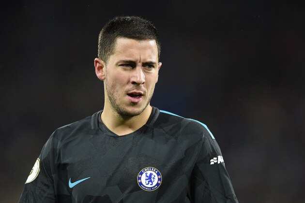 Chelsea's Belgian midfielder Eden Hazard looks on during the English Premier League football match between Huddersfield Town and Chelsea at the John Smith's stadium in Huddersfield, northern England on December 12, 2017. / AFP PHOTO / Oli SCARFF / RESTRICTED TO EDITORIAL USE. No use with unauthorized audio, video, data, fixture lists, club/league logos or 'live' services. Online in-match use limited to 75 images, no video emulation. No use in betting, games or single club/league/player publications.  /         (Photo credit should read OLI SCARFF/AFP/Getty Images)