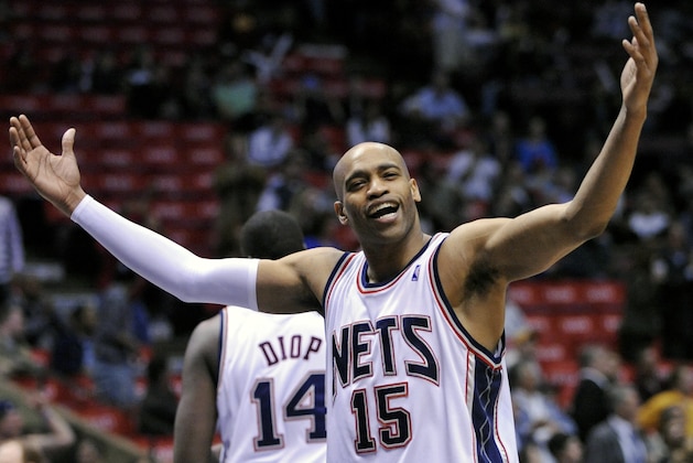 New Jersey Nets' Vince Carter gestures to fans during the fourth quarter of an NBA basketball game against the Charlotte Bobcats on Tuesday night, April 15, 2008, in East Rutherford, N.J. Carter scored 18 points as the Nets beat the Bobcats 112-108 in overtime. (AP Photo/Bill Kostroun)