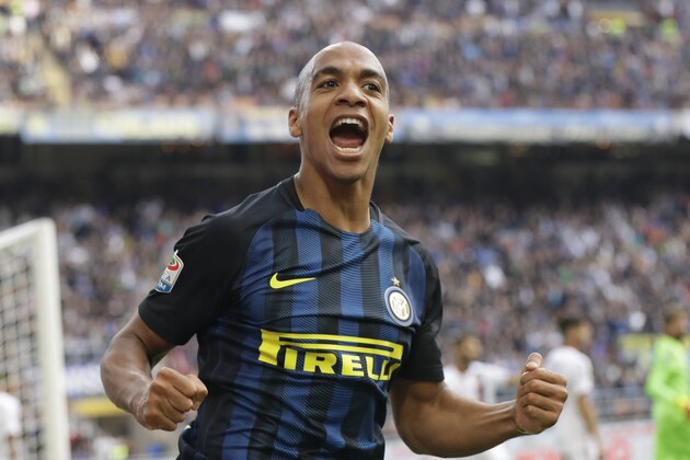Inter Milan's Joao Mario celebrates after scoring during a Serie A soccer match between Inter Milan and Cagliari, at the San Siro stadium in Milan, Italy, Sunday, Oct. 16, 2016. (AP Photo/Luca Bruno)