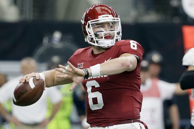 FILE - In this Dec. 2, 2017, file photo, Oklahoma quarterback Baker Mayfield (6) throws a pass in the first half of the Big 12 Conference championship NCAA college football game against TCU  in Arlington, Texas. Mayfield, reigning Heisman winner Lamar Jackson of Louisville and Stanford running back Bryce Love were chosen as finalists for the Heisman Trophy on Monday, Dec. 4, 2017. (AP Photo/Tony Gutierrez, File)