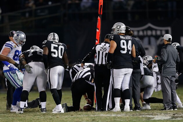 OAKLAND, CA - DECEMBER 17: Officials measure the ball position after a play by the Dallas Cowboys against the Oakland Raiders at Oakland-Alameda County Coliseum on December 17, 2017 in Oakland, California. (Photo by Lachlan Cunningham/Getty Images)