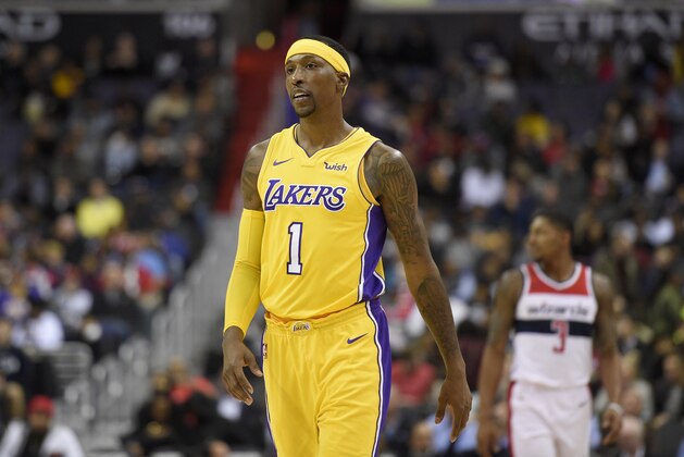 Los Angeles Lakers guard Kentavious Caldwell-Pope (1) looks on during the second half of an NBA basketball game against the Washington Wizards, Thursday, Nov. 9, 2017, in Washington. The Wizards won 111-95. (AP Photo/Nick Wass)