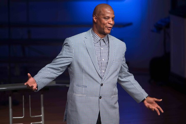 ADVANCE FOR WEEKEND EDITIONS, MAY 8-10 - In this April 24, 2015, photo former baseball player Darryl Strawberry gives a sermon in Bear, Del. His promising career was derailed by drug addiction, domestic violence, tax woes and a bout with a cancer. Strawberry is on a new path these days, speaking with his wife from the pulpit and spreading his story of redemption.  (AP Photo/Suchat Pederson)