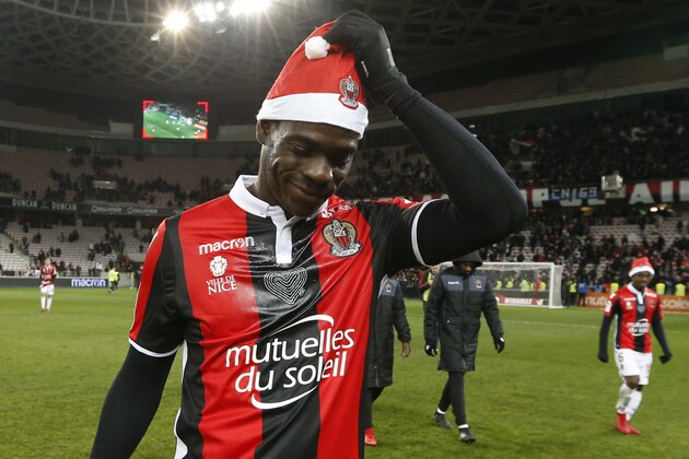 Nice's Italian forward Mario Balotelli celebrates at the end of the French L1 football match Nice vs Bordeaux on December 17, 2017 at the 'Allianz Riviera' stadium in Nice, southeastern France. / AFP PHOTO / VALERY HACHE        (Photo credit should read VALERY HACHE/AFP/Getty Images)