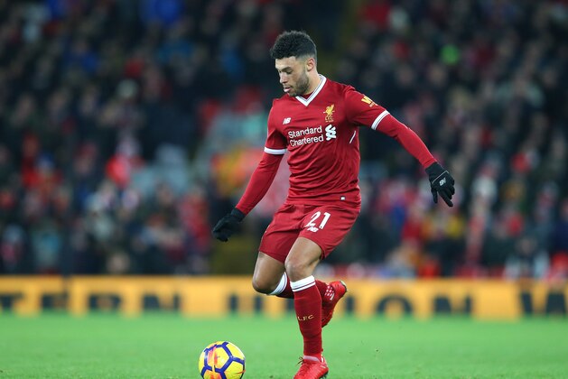 LIVERPOOL, ENGLAND - DECEMBER 13:  Alex Oxlade-Chamberlain of Liverpool runs with the ball during the Premier League match between Liverpool and West Bromwich Albion at Anfield on December 13, 2017 in Liverpool, England.  (Photo by Alex Livesey - Danehouse/Getty Images)