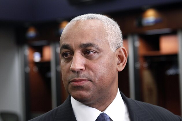 FILE - In this Oct. 4, 2010, file photo, Omar Minaya speaks to the media in the New York Mets clubhouse at Citi Field in New York.    A person familiar with the decision says former New York Mets general manager Omar Minaya is leaving his job as senior vice president of the San Diego Padres to become a special adviser to Major League Baseball Players Association head Tony Clark. The person spoke on condition of anonymity to The Associated Press on Thursday, Jan. 29, 2015, because the hiring had not been made public. The union was expected to announce the decision later in the day. (AP Photo/Seth Wenig, File)