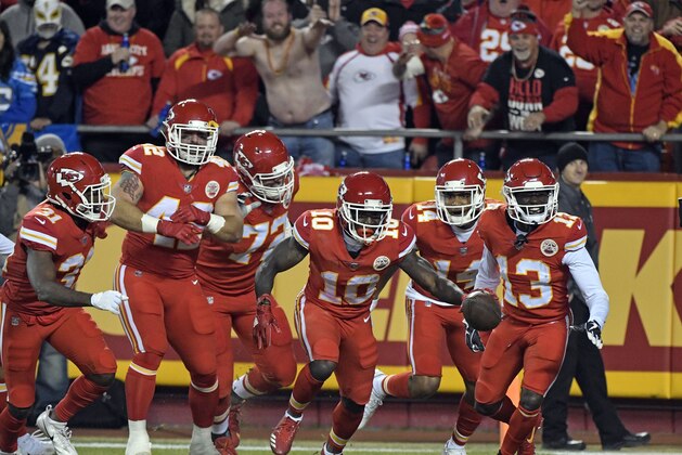 Kansas City Chiefs wide receiver Tyreek Hill (10) celebrates his touchdown against the Los Angeles Chargers with teammates during the first half of an NFL football game in Kansas City, Mo., Saturday, Dec. 16, 2017. (AP Photo/Ed Zurga)
