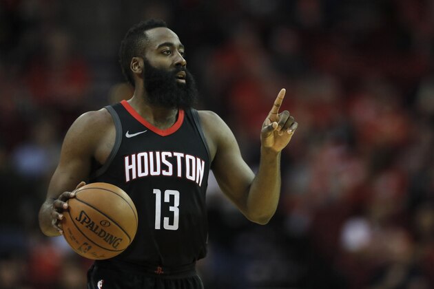 HOUSTON, TX - DECEMBER 22:  James Harden #13 of the Houston Rockets brings the ball down the court in the first half against the LA Clippers at Toyota Center on December 22, 2017 in Houston, Texas.  NOTE TO USER: User expressly acknowledges and agrees that, by downloading and or using this Photograph, user is consenting to the terms and conditions of the Getty Images License Agreement.  (Photo by Tim Warner/Getty Images)