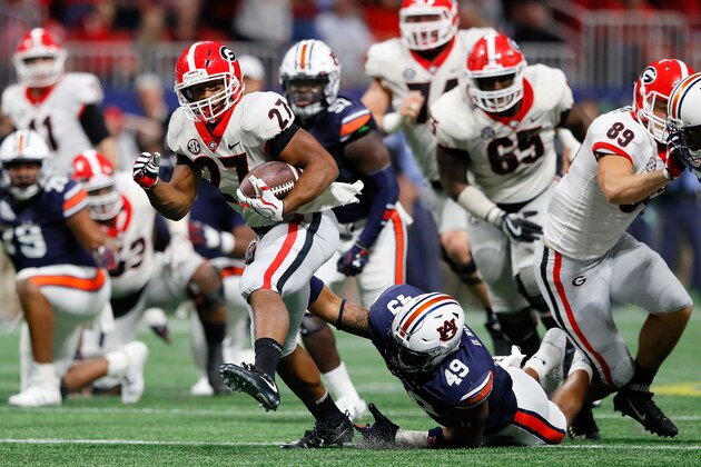 ATLANTA, GA - DECEMBER 02: Nick Chubb #27 of the Georgia Bulldogs runs the ball during the second half against the Auburn Tigers in the SEC Championship at Mercedes-Benz Stadium on December 2, 2017 in Atlanta, Georgia. (Photo by Kevin C.  Cox/Getty Images)