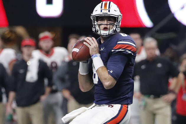 Auburn quarterback Jarrett Stidham (8) works against Georgia during the first half of the Southeastern Conference championship NCAA college football game, Saturday, Dec. 2, 2017, in Atlanta. (AP Photo/David Goldman)