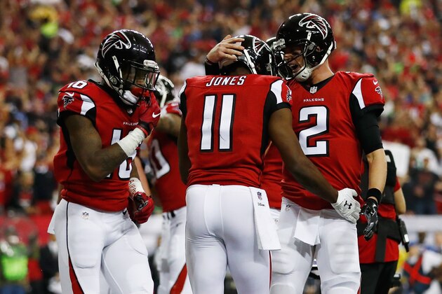 ATLANTA, GA - JANUARY 14:   Matt Ryan #2 of the Atlanta Falcons and  Julio Jones #11 of the Atlanta Falcons react after scoring a touchdown against the Seattle Seahawks at the Georgia Dome on January 14, 2017 in Atlanta, Georgia.  (Photo by Gregory Shamus/Getty Images)