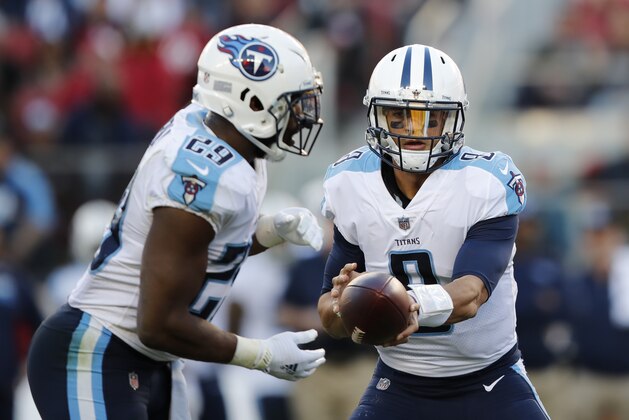 Tennessee Titans quarterback Marcus Mariota (8) hands off to running back DeMarco Murray (29) during the second half of an NFL football game against the San Francisco 49ers Sunday, Dec. 17, 2017, in Santa Clara, Calif. (AP Photo/John Hefti)