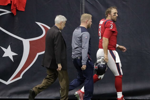 Houston Texans quarterback Tom Savage (3) leaves the game to get checked out during the first half of an NFL football game against the San Francisco 49ers, Sunday, Dec. 10, 2017, in Houston. (AP Photo/David J. Phillip)