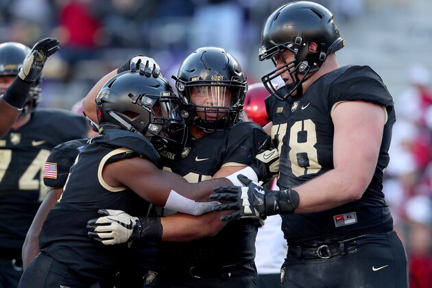 FORT WORTH, TX - DECEMBER 23:  Darnell Woolfolk #33 of the Army Black Knights celebrates after scoring a touchdown against the San Diego State Aztecs in the Lockheed Martin Armed Forces Bowl at Amon G. Carter Stadium on December 23, 2017 in Fort Worth, Texas.  (Photo by Tom Pennington/Getty Images)
