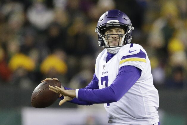 Minnesota Vikings' Case Keenum throws during the first half of an NFL football game against the Green Bay Packers Saturday, Dec. 23, 2017, in Green Bay, Wis. (AP Photo/Jeffrey Phelps)