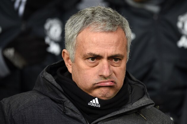 Manchester United's Portuguese manager Jose Mourinho gestures as he awaits kick off in the English Premier League football match between West Bromwich Albion and Manchester United at The Hawthorns stadium in West Bromwich, central England, on December 17, 2017.
 / AFP PHOTO / Oli SCARFF / RESTRICTED TO EDITORIAL USE. No use with unauthorized audio, video, data, fixture lists, club/league logos or 'live' services. Online in-match use limited to 75 images, no video emulation. No use in betting, games or single club/league/player publications.  /         (Photo credit should read OLI SCARFF/AFP/Getty Images)