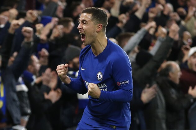 Chelsea's Eden Hazard celebrates after Atletico's Stefan Savic scored an own goal during the Champions League Group C soccer match between Chelsea and Atletico Madrid at Stamford Bridge stadium in London Tuesday, Dec. 5, 2017. (AP Photo/Alastair Grant)