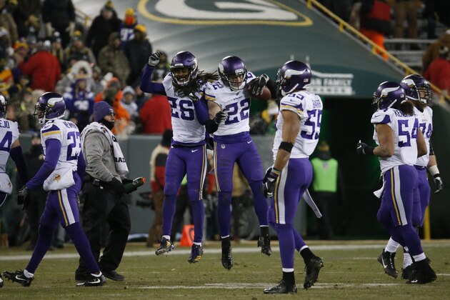 Minnesota Vikings' Harrison Smith (22) celebrates his second interception of the game during the fourth quarter of an NFL football game against the Green Bay Packers Saturday, Dec. 23, 2017, in Green Bay, Wis. The Vikings won 16-0. (AP Photo/Mike Roemer)
