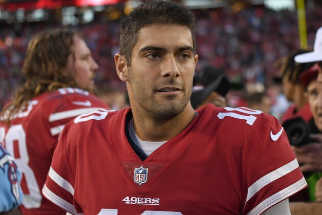 SANTA CLARA, CA - DECEMBER 17:  Jimmy Garoppolo #10 of the San Francisco 49ers looks on after they defeated the Tennessee Titans 25-23 in an NFL football game at Levi's Stadium on December 17, 2017 in Santa Clara, California.  (Photo by Thearon W. Henderson/Getty Images)