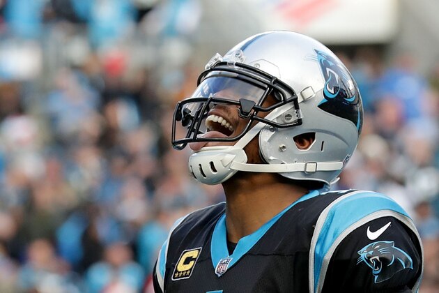 CHARLOTTE, NC - DECEMBER 24:  Cam Newton #1 of the Carolina Panthers reacts after scoring the game winning touchdown against the Tampa Bay Buccaneers in the fourth quarter during their game at Bank of America Stadium on December 24, 2017 in Charlotte, North Carolina.  (Photo by Streeter Lecka/Getty Images)