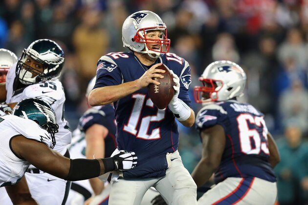 FOXBORO, MA - DECEMBER 06:  Tom Brady #12 of the New England Patriots is pressured in the pocket against the Philadelphia Eagles at Gillette Stadium on December 6, 2015 in Foxboro, Massachusetts.  (Photo by Maddie Meyer/Getty Images)