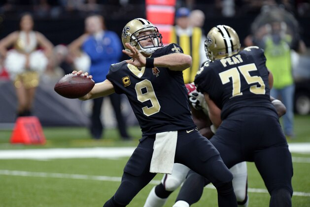 New Orleans Saints quarterback Drew Brees (9) passes in the second half of an NFL football game against the Atlanta Falcons in New Orleans, Sunday, Dec. 24, 2017. (AP Photo/Bill Feig)