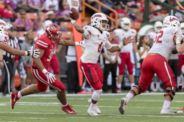 Fresno State quarterback Marcus McMaryion (6) throws a pass while playing against Houston in the first half of the Hawaii Bowl NCAA college football game, Sunday, Dec. 24, 2017, in Honolulu. (AP Photo/Eugene Tanner)