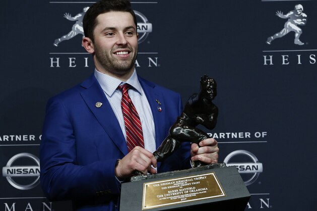 NEW YORK, NY - DECEMBER 09: Baker Mayfield, quarterback of the Oklahoma Sooners, poses for the media after the 2017 Heisman Trophy Presentation at the Marriott Marquis December 9, 2017 in New York City. (Photo by Jeff Zelevansky/Getty Images)