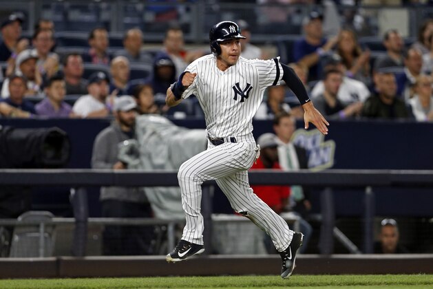 NEW YORK, NY - SEPTEMBER 19: Jacoby Ellsbury #22 of the New York Yankees in action against the Minnesota Twins during the fourth inning at Yankee Stadium on September 19, 2017 in the Bronx borough of New York City. (Photo by Adam Hunger/Getty Images)
