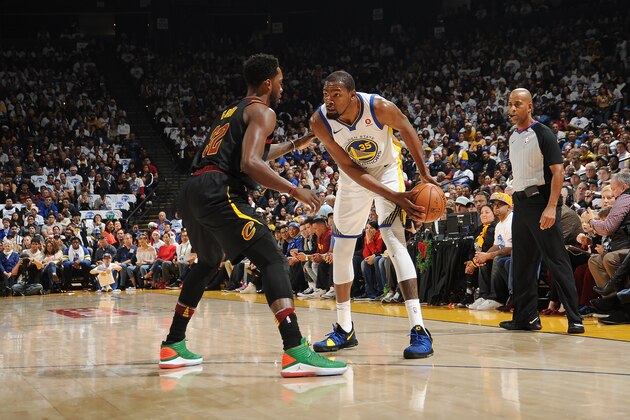 OAKLAND, CA - DECEMBER 25:   Kevin Durant #35 of the Golden State Warriors handles the ball against Jeff Green #32 of the Cleveland Cavaliers on December 25, 2017 at ORACLE Arena in Oakland, California. NOTE TO USER: User expressly acknowledges and agrees that, by downloading and or using this photograph, user is consenting to the terms and conditions of Getty Images License Agreement. Mandatory Copyright Notice: Copyright 2017 NBAE (Photo by Noah Graham/NBAE via Getty Images)