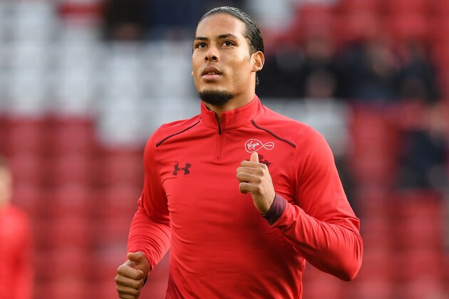 Southampton's Dutch defender Virgil van Dijk warms up ahead of  the English Premier League football match between Liverpool and Southampton at Anfield in Liverpool, north west England on November 18, 2017. / AFP PHOTO / Paul ELLIS / RESTRICTED TO EDITORIAL USE. No use with unauthorized audio, video, data, fixture lists, club/league logos or 'live' services. Online in-match use limited to 75 images, no video emulation. No use in betting, games or single club/league/player publications.  /         (Photo credit should read PAUL ELLIS/AFP/Getty Images)