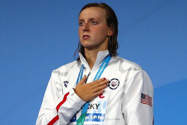 BUDAPEST, HUNGARY - JULY 29:  Ggold medalist Katie Ledecky of the United States poses with the medal won during the Women's 800m Freestyle final on day sixteen of the Budapest 2017 FINA World Championships on July 29, 2017 in Budapest, Hungary.  (Photo by Clive Rose/Getty Images)
